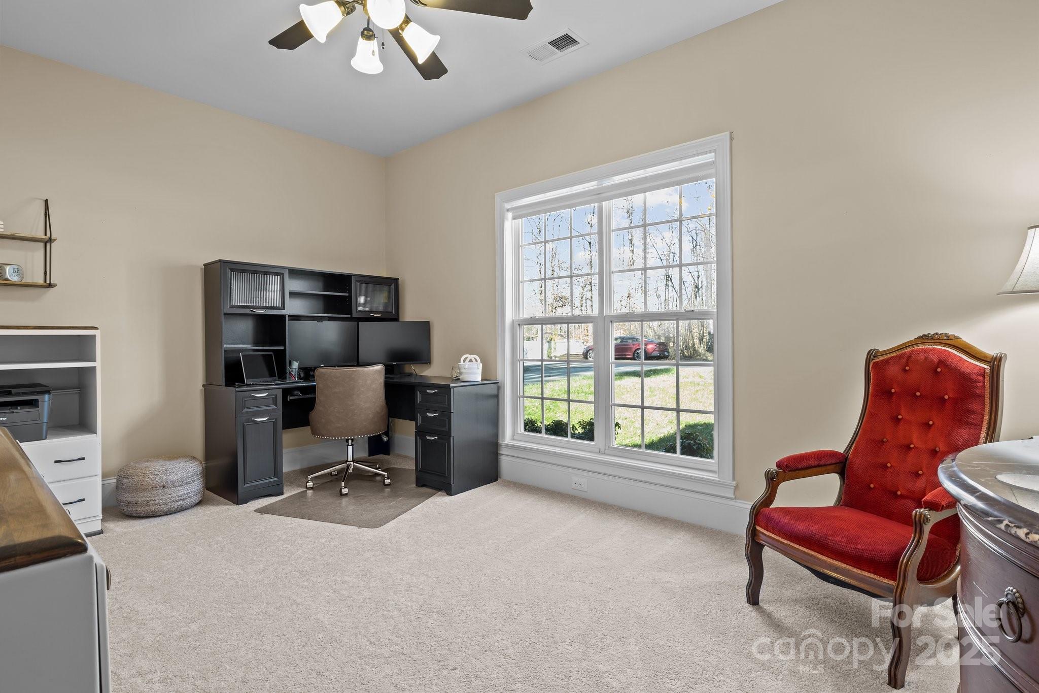 574 Barber Loop Mooresville, NC 28117 - Photo 21 of 34 a work room with furniture and windows