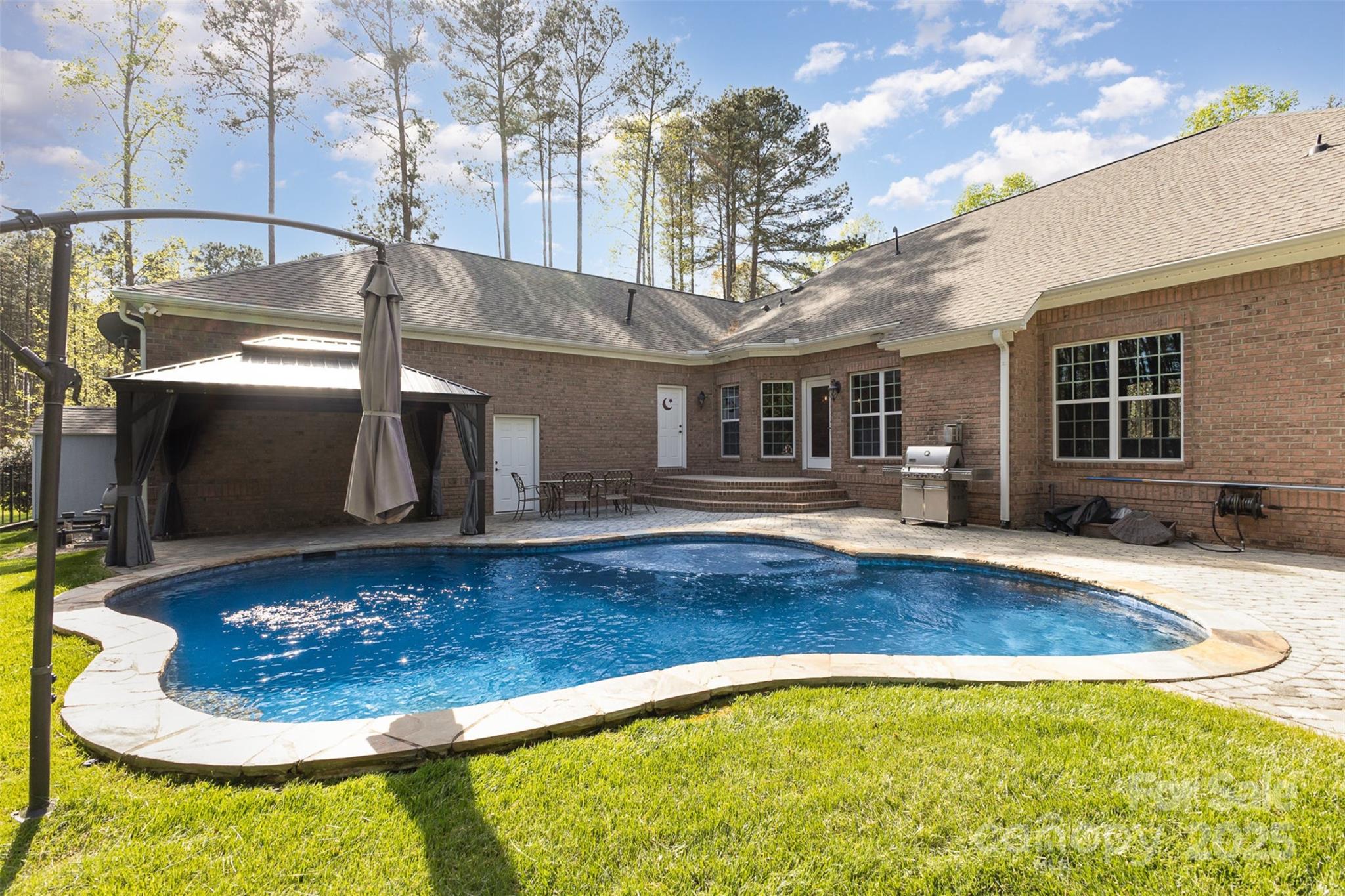 574 Barber Loop Mooresville, NC 28117 - Photo 26 of 34 a view of a house with swimming pool