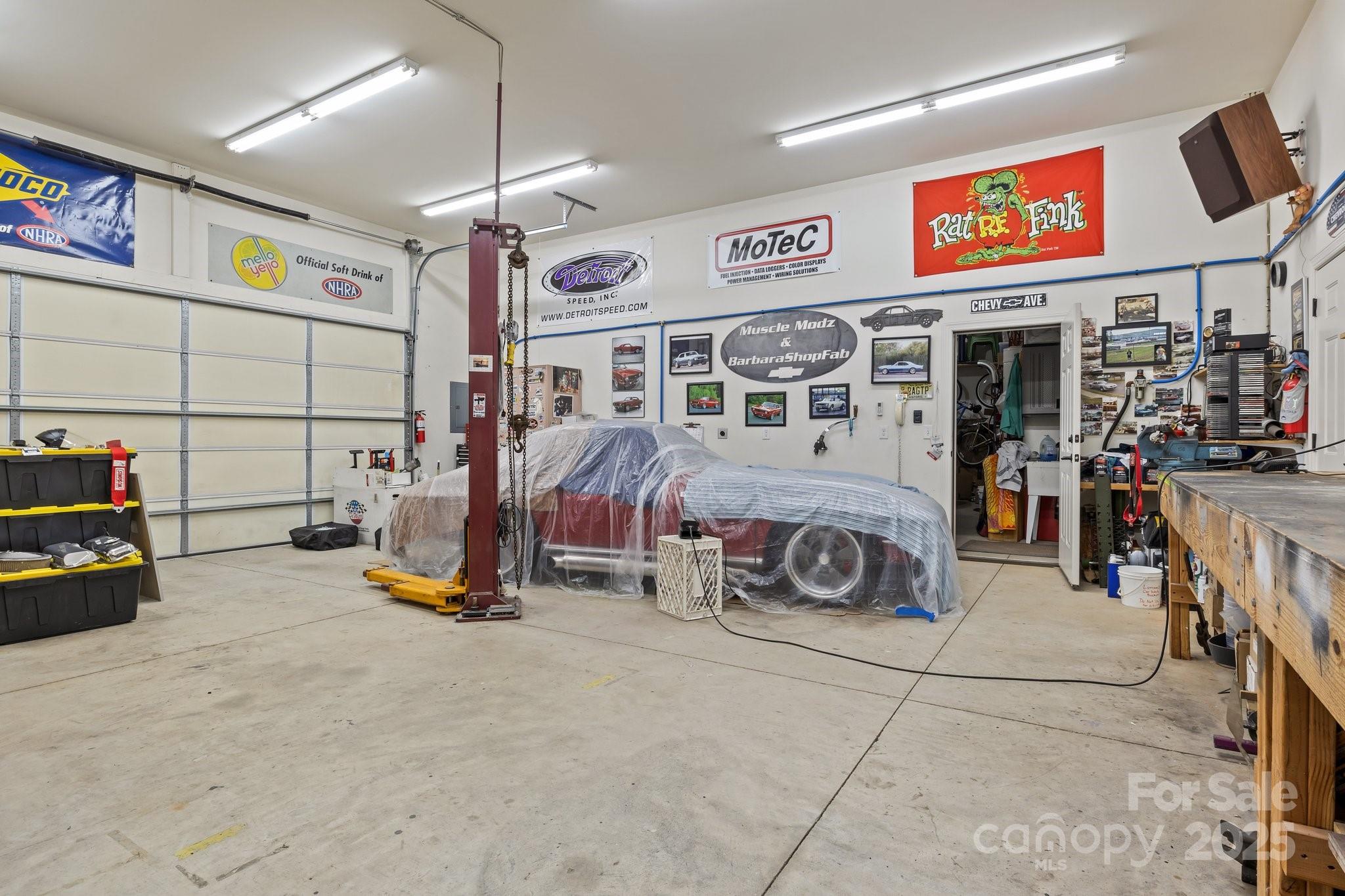 574 Barber Loop Mooresville, NC 28117 - Photo 33 of 34 a view of a room with gym equipment