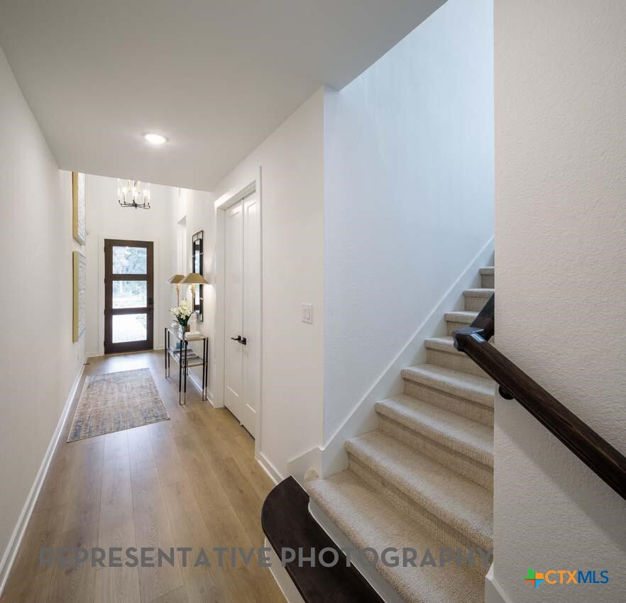 8808 Fallkill Drive Austin, TX 78744 - Photo 22 of 34 a view of entryway with wooden floor