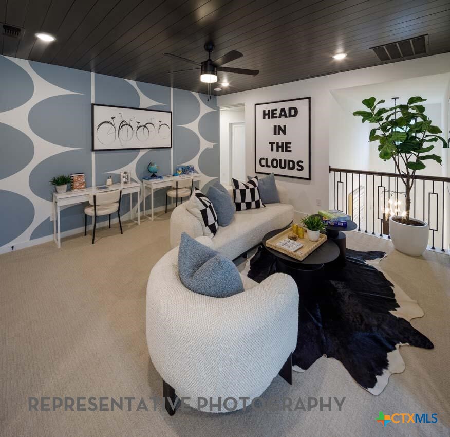 8808 Fallkill Drive Austin, TX 78744 - Photo 25 of 34 a living room with furniture and a large window