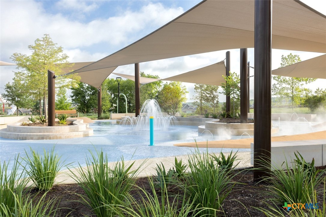 8808 Fallkill Drive Austin, TX 78744 - Photo 31 of 34 a view of a floor to ceiling window with garden view