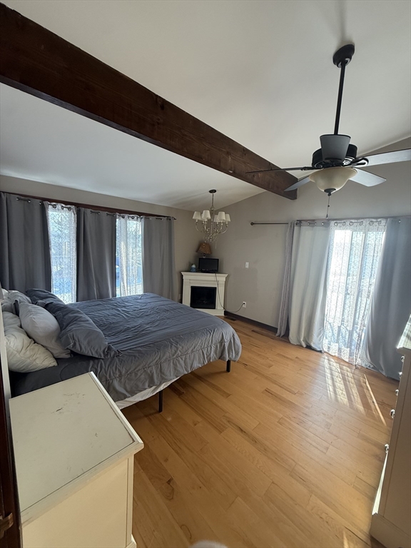 271 Central Avenue Scituate, MA 02050 - Photo 11 of 18 a bedroom with a bed and large windows