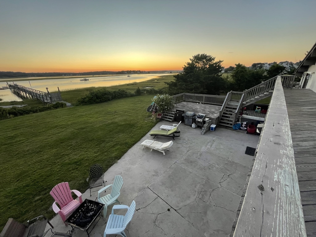 271 Central Avenue Scituate, MA 02050 - Photo 18 of 18 a view of a terrace with a garden