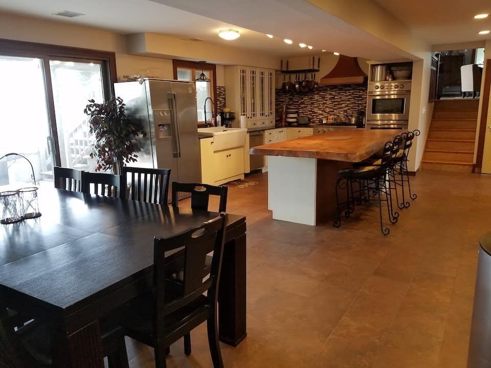 271 Central Avenue Scituate, MA 02050 - Photo 2 of 18 a dining table with chairs and wooden floor