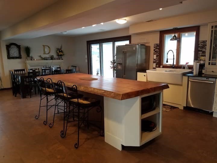 271 Central Avenue Scituate, MA 02050 - Photo 3 of 18 a dining hall with stainless steel appliances granite countertop a stove and a refrigerator