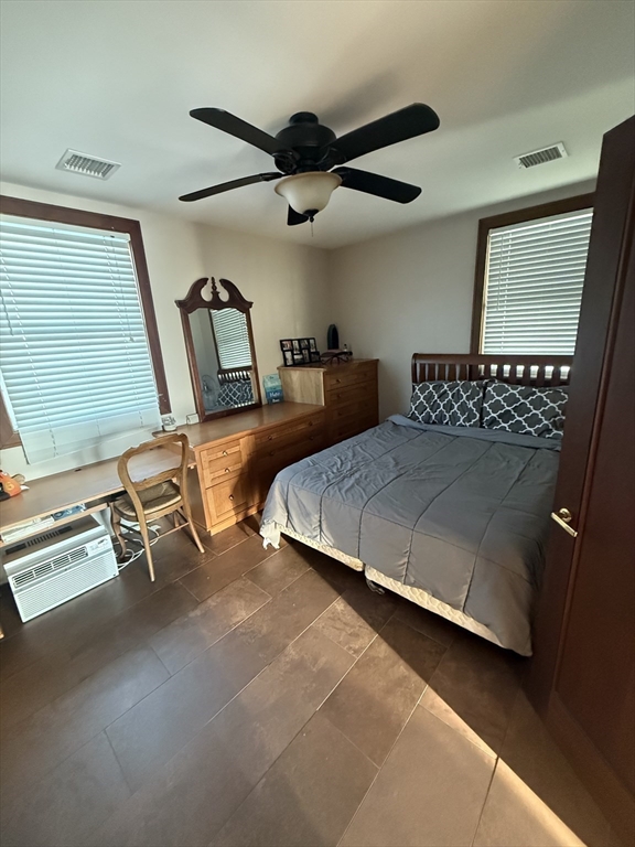 271 Central Avenue Scituate, MA 02050 - Photo 10 of 18 a bedroom with two beds and ceiling fan