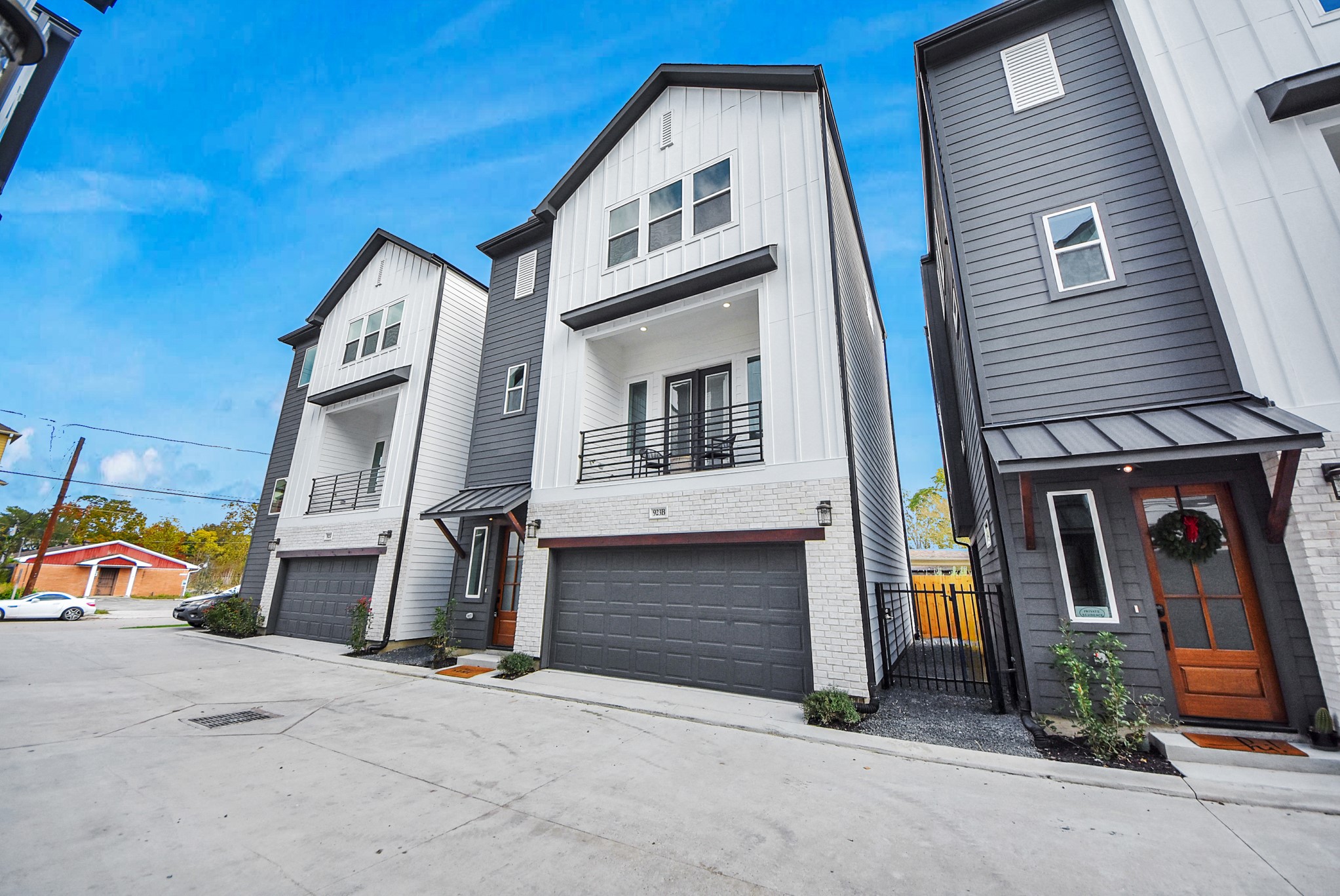 927 Fisher Street, Unit B Houston, TX 77018 - Photo 44 of 47 These modern three-story townhomes showcase clean lines and mixed materials, each with a two-car garage and balcony. The design blends style and functionality, ideal for urban living.