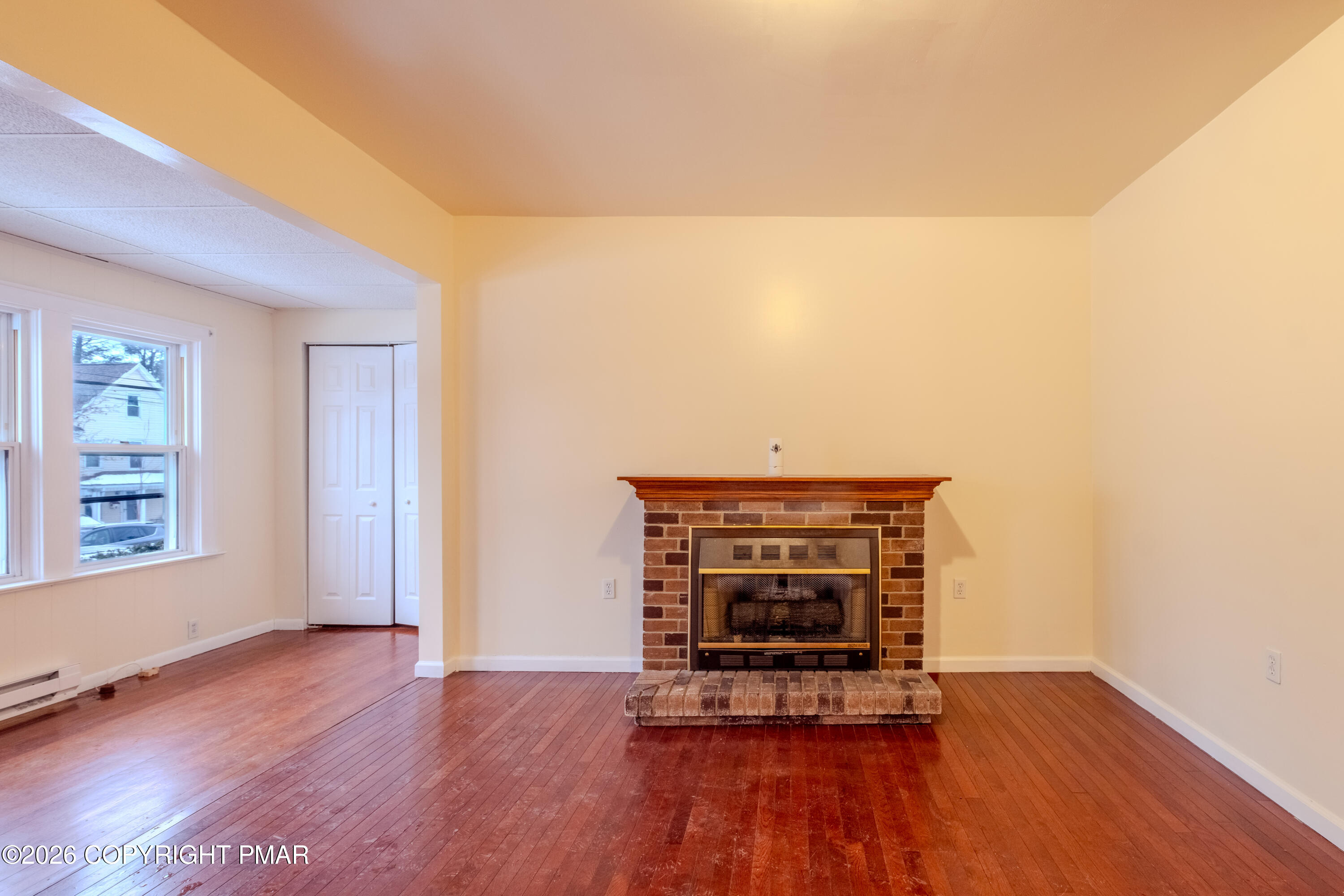 1042 Taylor Avenue Scranton, PA 18510 - Photo 12 of 40 a living room with furniture and wooden floor