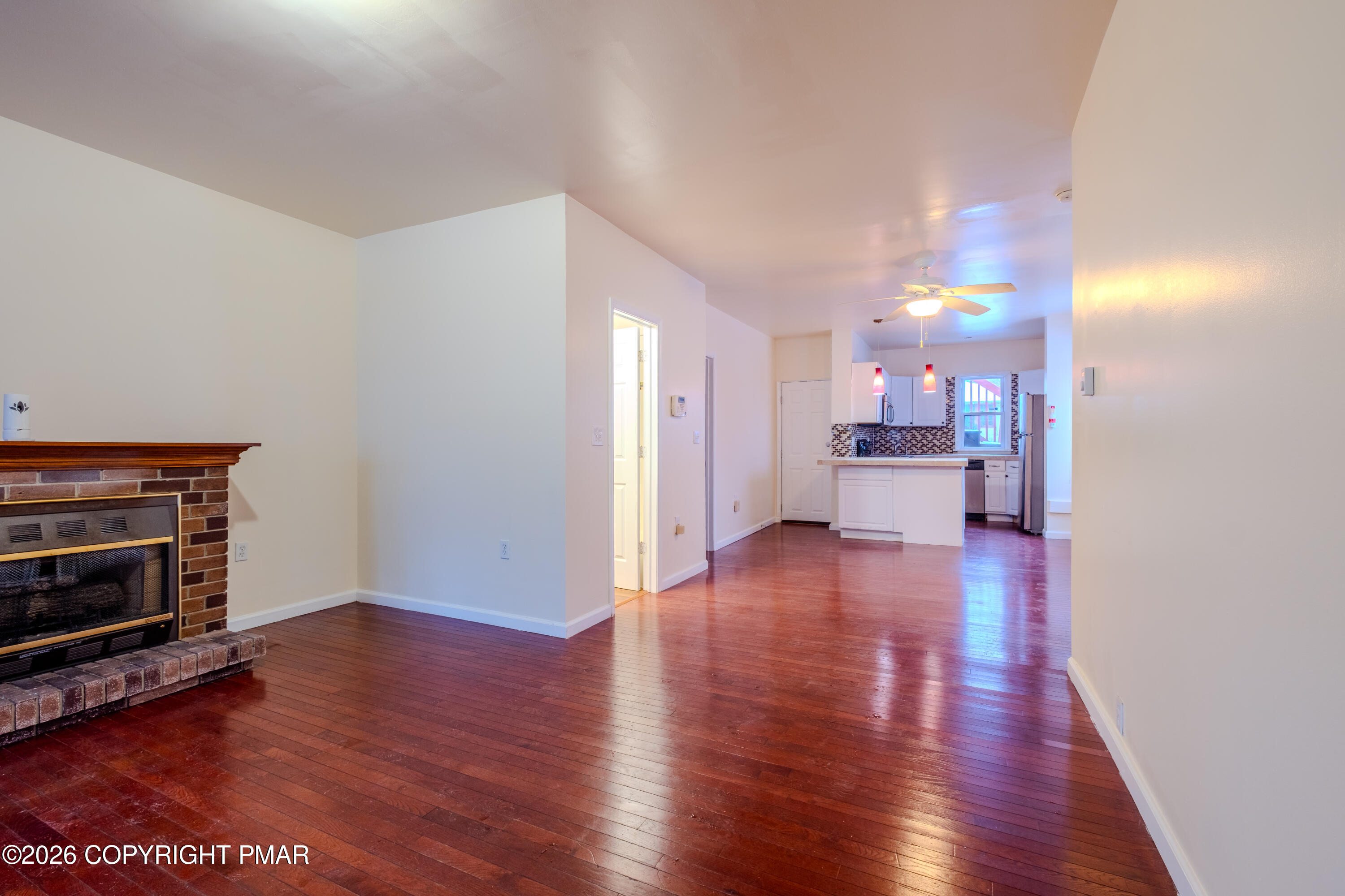 1042 Taylor Avenue Scranton, PA 18510 - Photo 14 of 40 a view of empty room with wooden floor