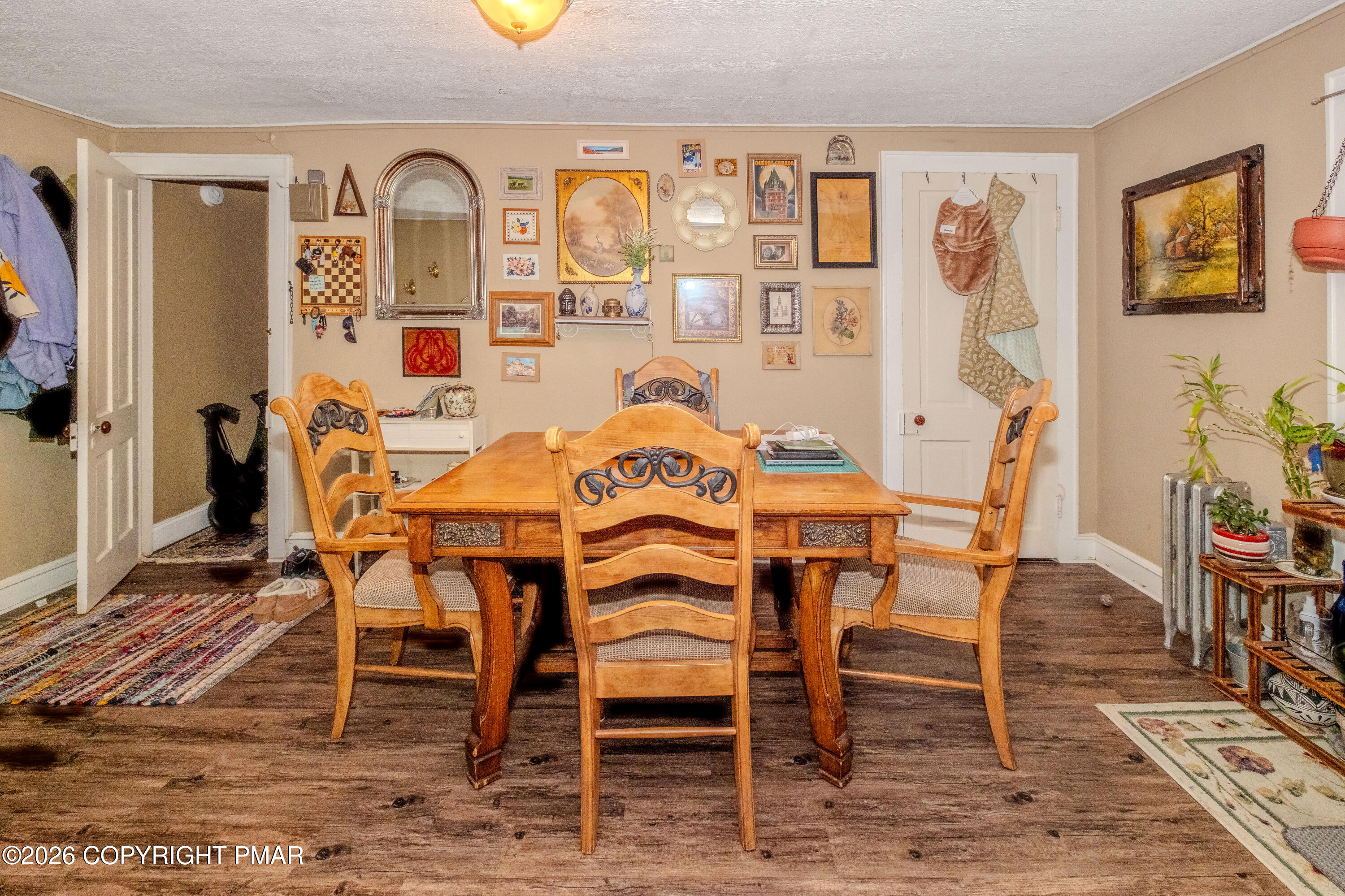 1042 Taylor Avenue Scranton, PA 18510 - Photo 31 of 40 a view of a dining room with furniture and wooden floor