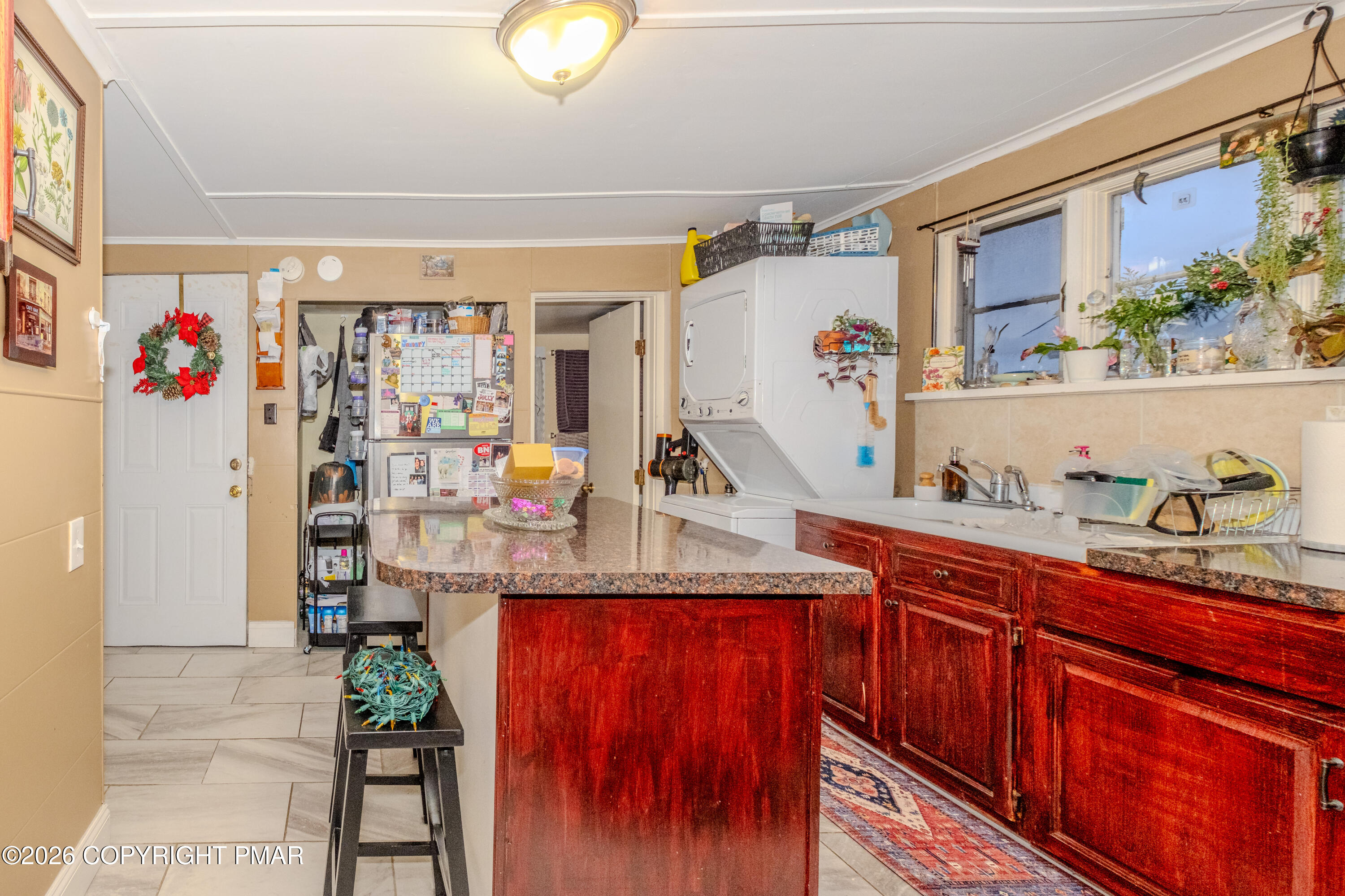 1042 Taylor Avenue Scranton, PA 18510 - Photo 32 of 40 a view of living room with granite countertop furniture and garden view