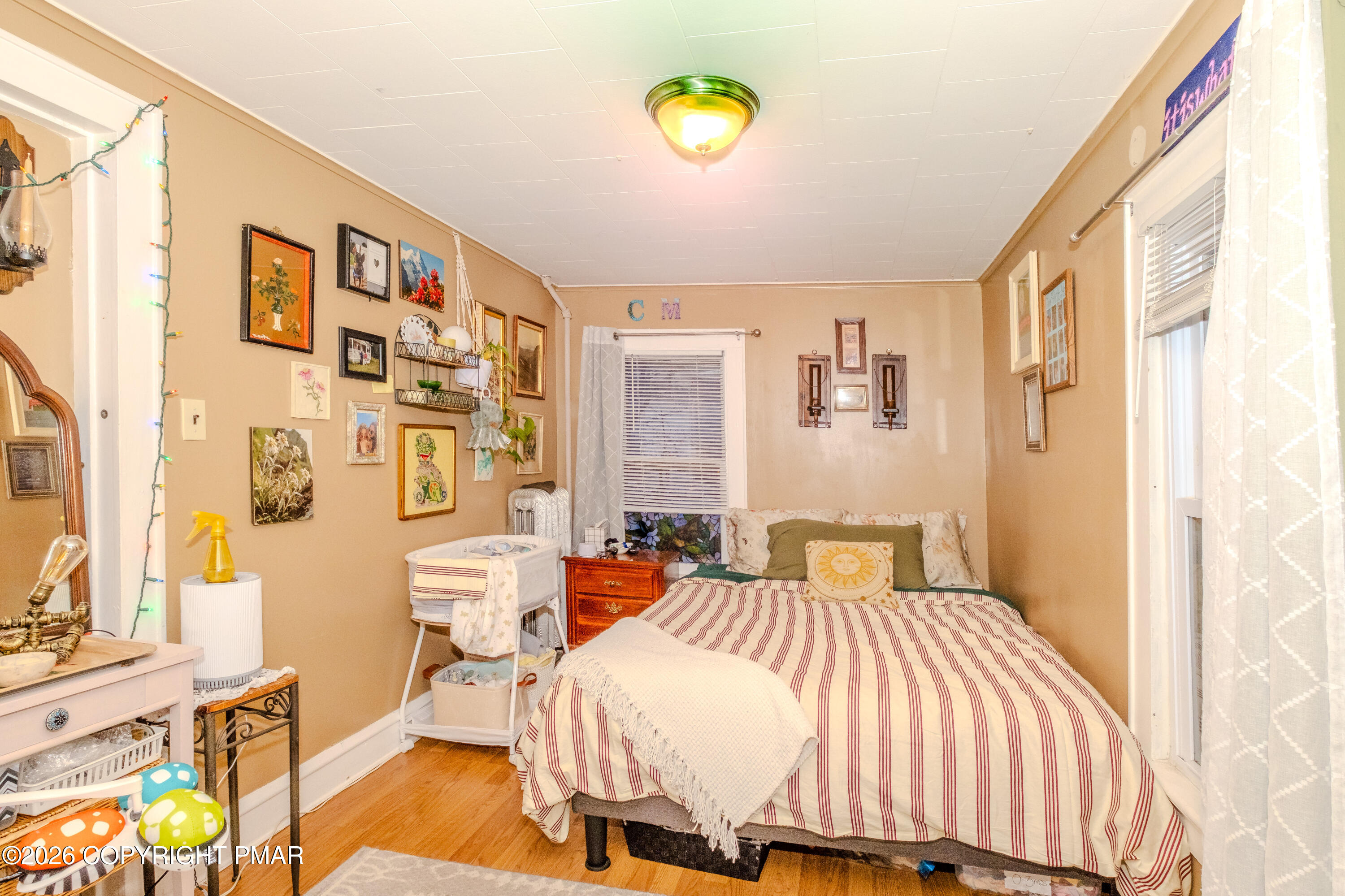 1042 Taylor Avenue Scranton, PA 18510 - Photo 35 of 40 a bedroom with a bed and a cabinets