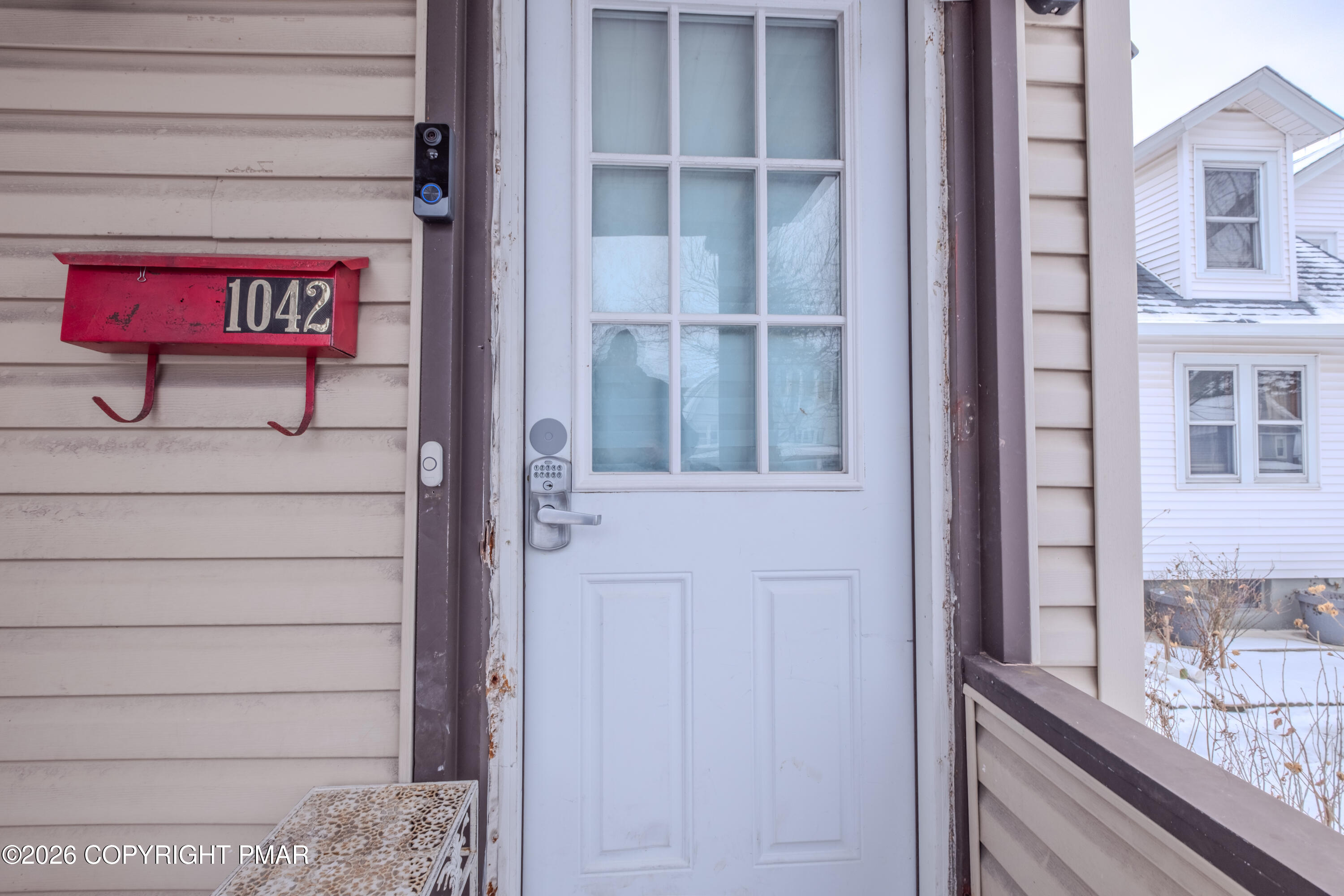 1042 Taylor Avenue Scranton, PA 18510 - Photo 9 of 40 a view of a balcony with a bench