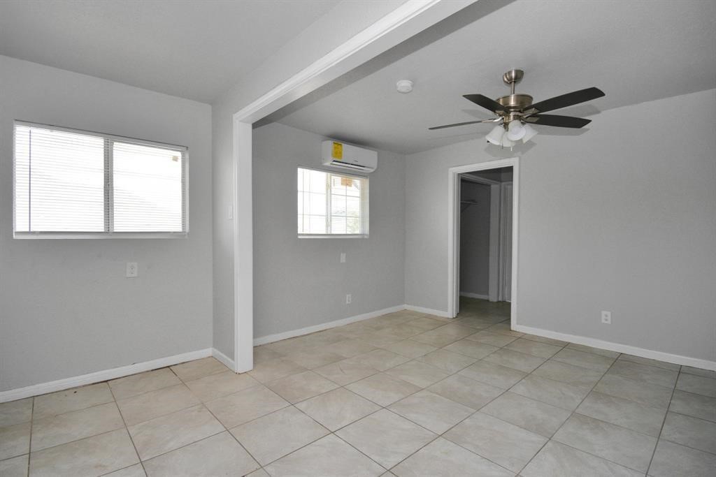 8127 Colonial Lane, Unit 2 Houston, TX 77051 - Photo 2 of 11 a view of an empty room with a window