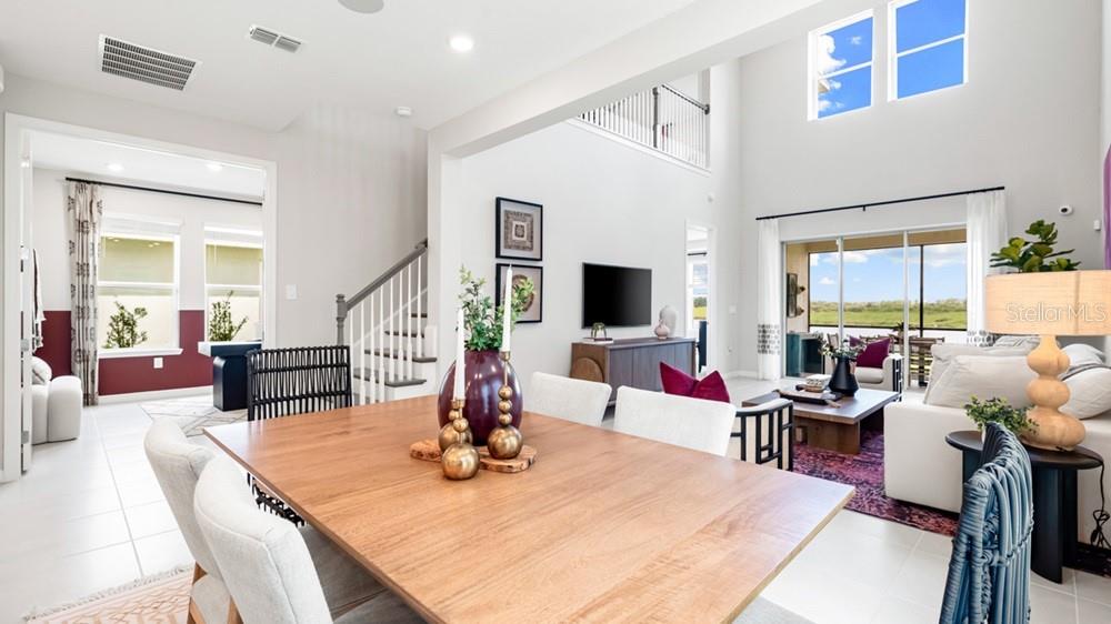 13505 Commons Avenue Parrish, FL 34219 - Photo 11 of 26 a living room with furniture and a flat screen tv