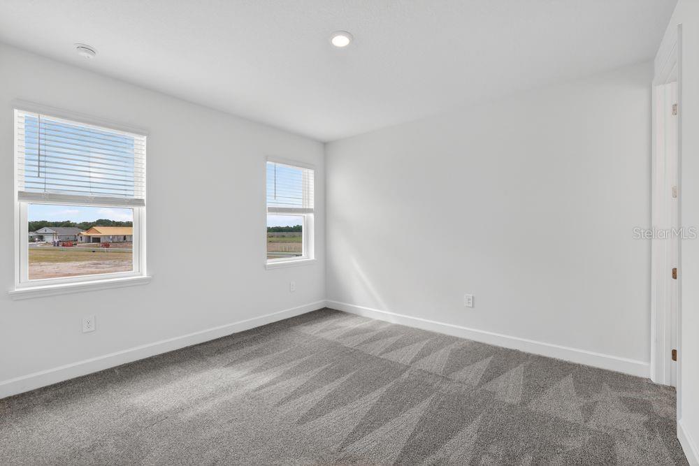 13505 Commons Avenue Parrish, FL 34219 - Photo 16 of 40 an empty room with windows