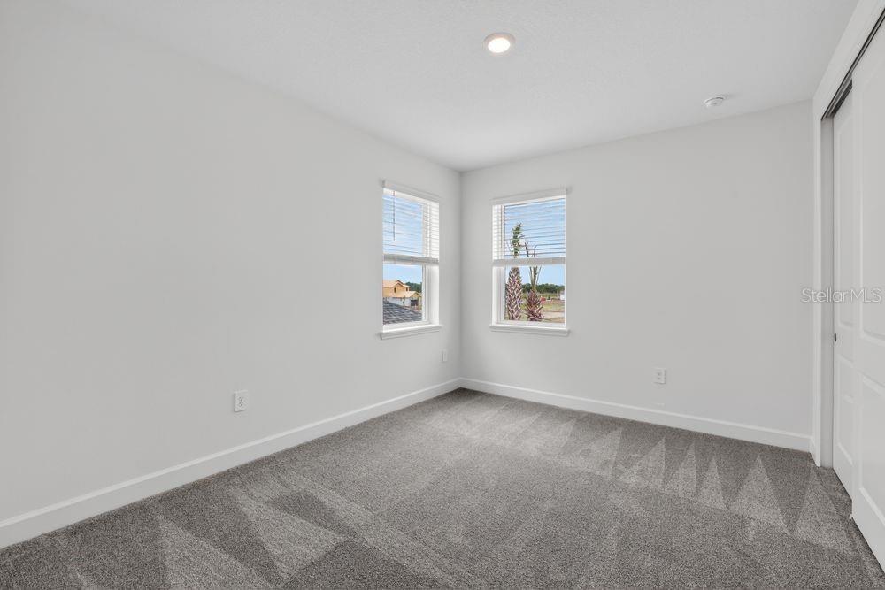 13505 Commons Avenue Parrish, FL 34219 - Photo 17 of 40 an empty room with windows