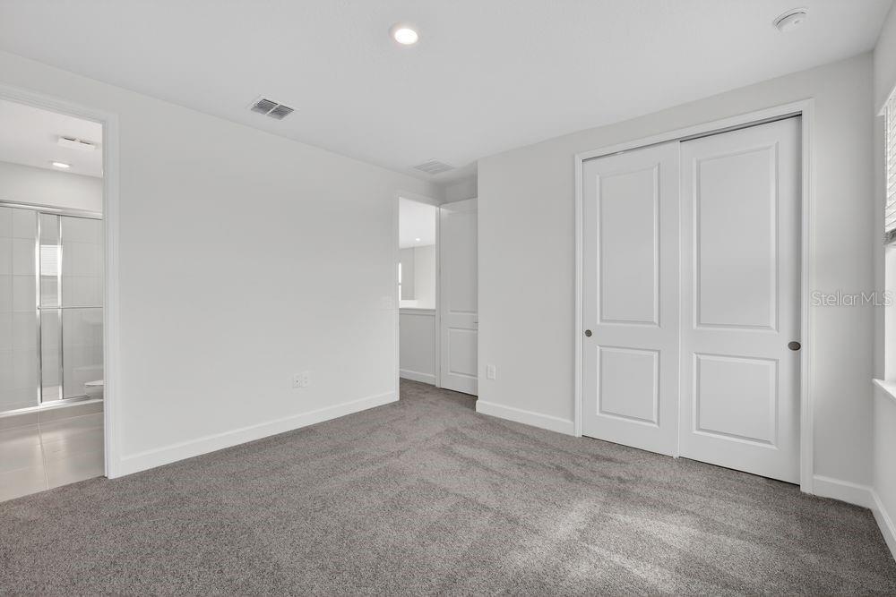 13505 Commons Avenue Parrish, FL 34219 - Photo 19 of 40 a view of an empty room and closet area
