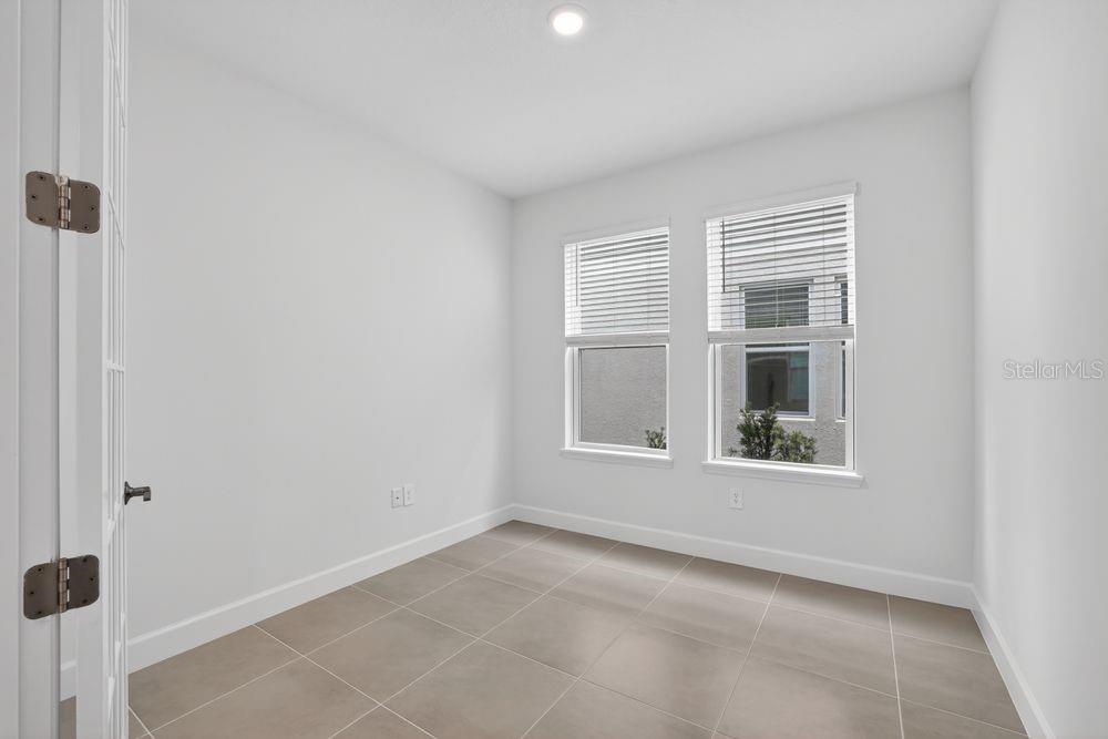 13505 Commons Avenue Parrish, FL 34219 - Photo 26 of 40 a view of an empty room with a window