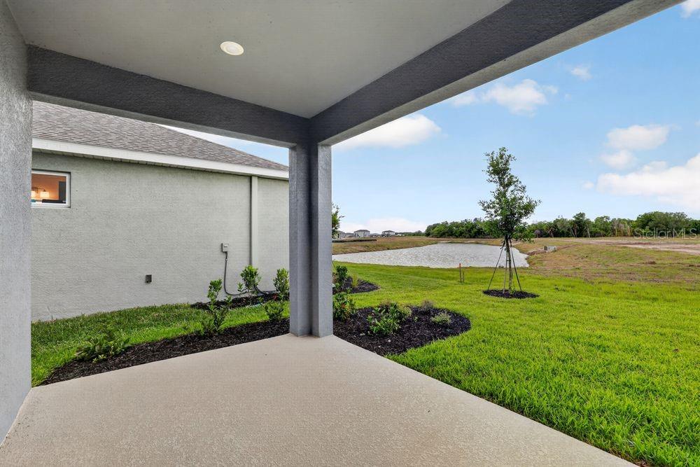 13505 Commons Avenue Parrish, FL 34219 - Photo 28 of 40 a view of a back yard