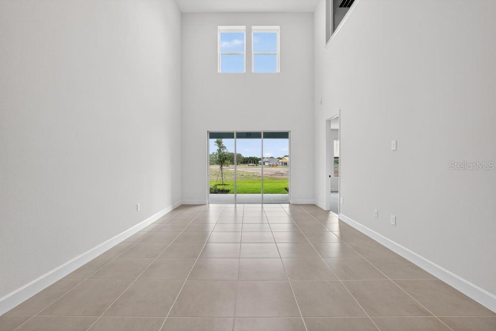 13505 Commons Avenue Parrish, FL 34219 - Photo 7 of 40 a view of a hallway with a window