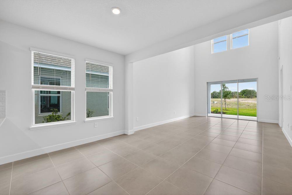 13505 Commons Avenue Parrish, FL 34219 - Photo 8 of 40 a view of an empty room with a window