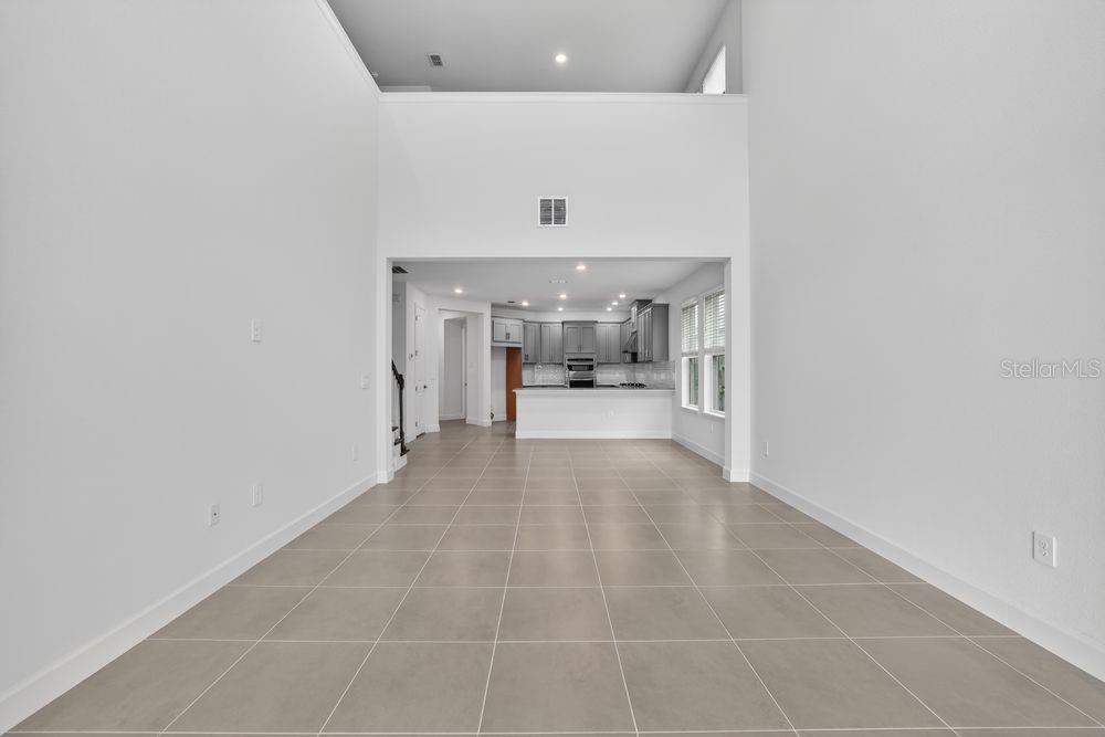 13505 Commons Avenue Parrish, FL 34219 - Photo 10 of 40 a view of a hallway with a kitchen