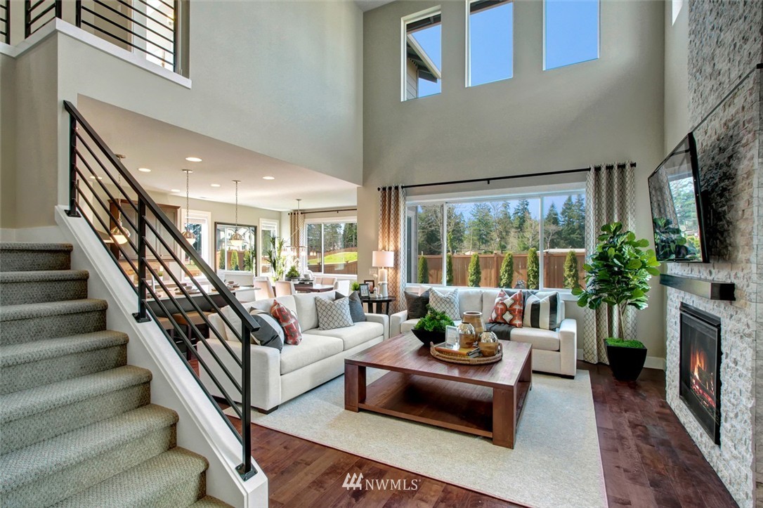 316 Field Place Southeast Renton, WA 98059 - Photo 5 of 16 a living room with furniture and a large window