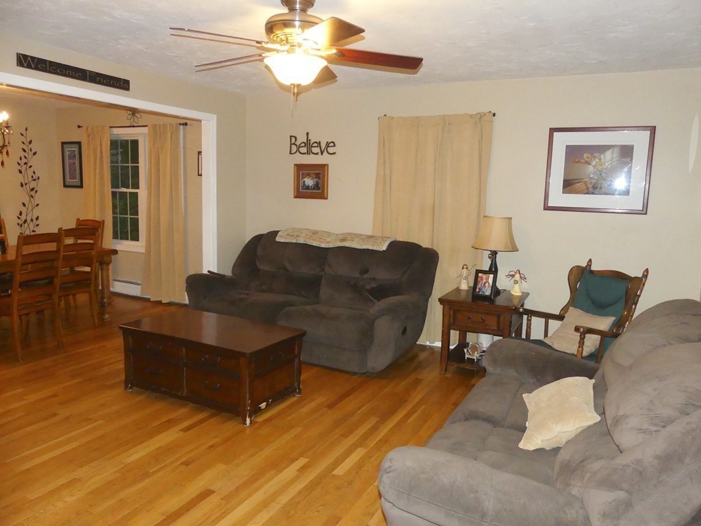 102 Coffey Hill Road Ware, MA 01082 - Photo 5 of 27 a living room with furniture and a wooden floor