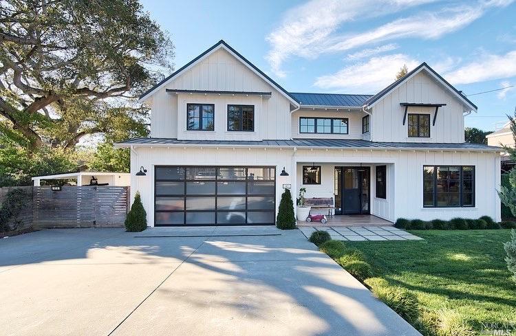 41 Shell Road Mill Valley, CA 94941 - Photo 1 of 1 a front view of a house with a yard and garage