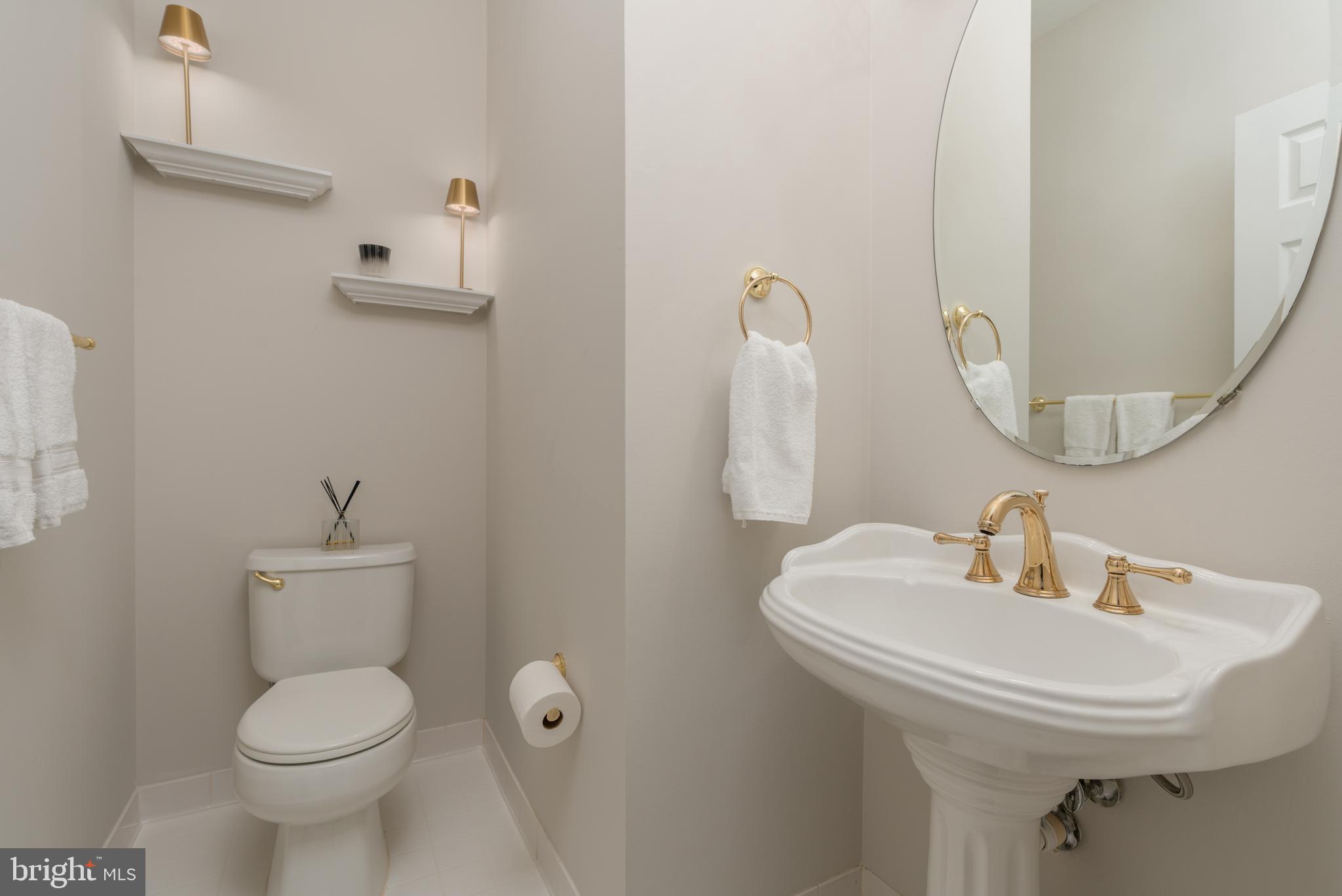 47543 Rippling Drive Sterling, VA 20165 - Photo 12 of 52 Main level 1/2 bath