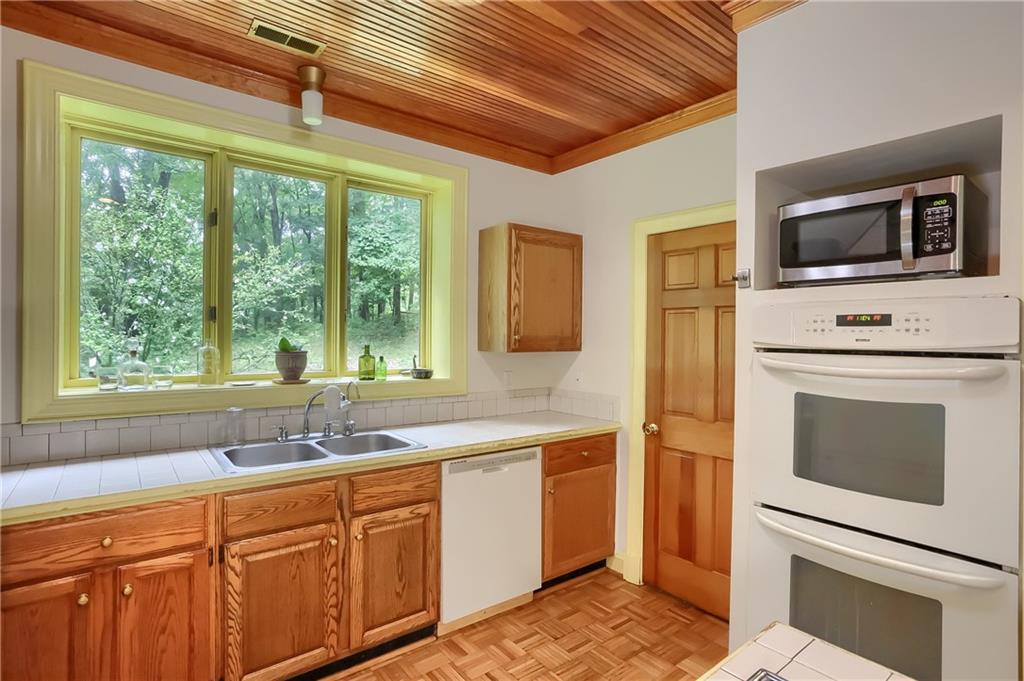 2064 Dime Road Vandergrift, PA 15690 - Photo 14 of 25 a kitchen with a sink and large window