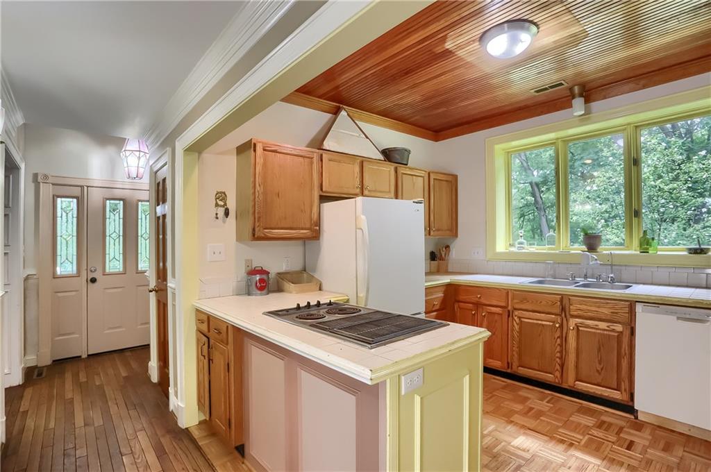 2064 Dime Road Vandergrift, PA 15690 - Photo 16 of 25 a kitchen that has a sink a stove and a refrigerator
