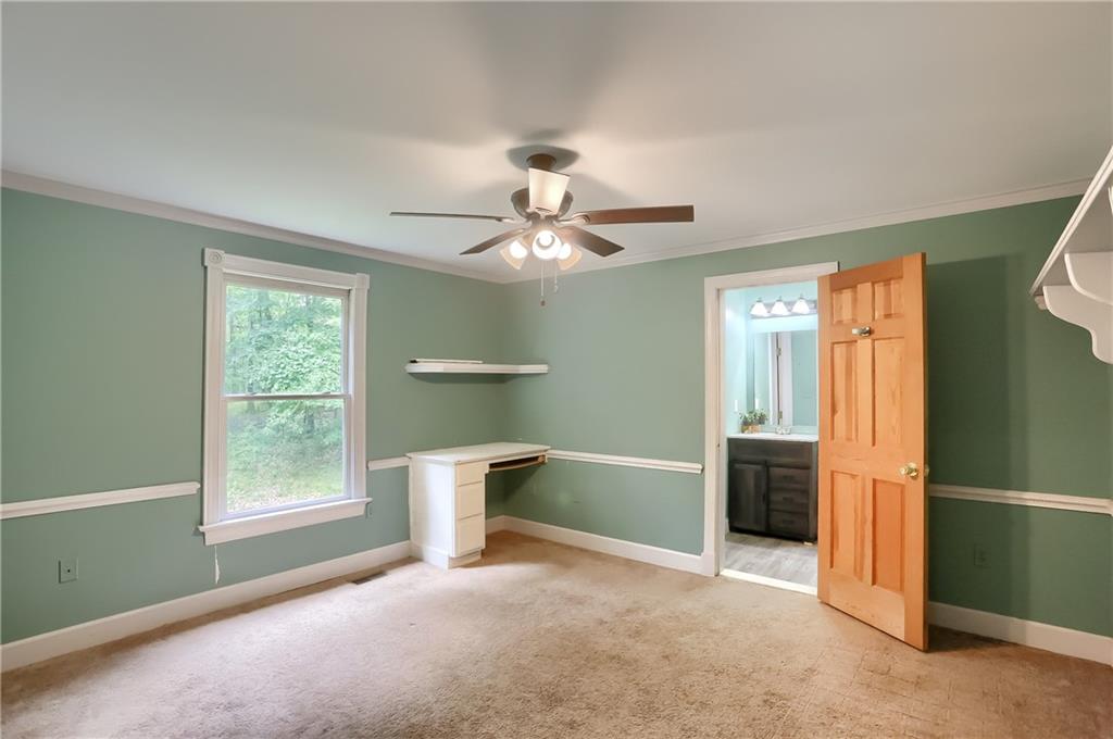 2064 Dime Road Vandergrift, PA 15690 - Photo 21 of 25 a view of an empty room with a window and a kitchen