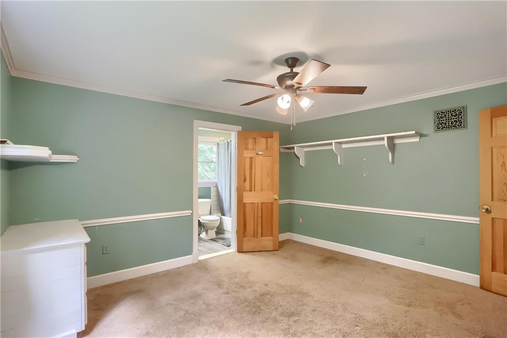 2064 Dime Road Vandergrift, PA 15690 - Photo 22 of 25 a view of a livingroom with a ceiling fan and a bathtub