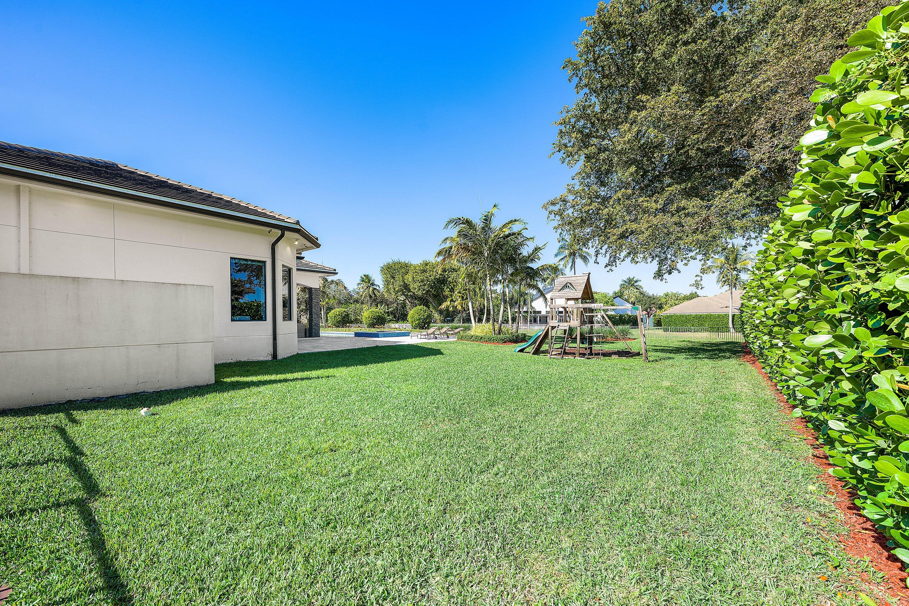 6773 Boniello Drive Boca Raton, FL 33496 - Photo 50 of 59 Private Greenspace in Backyard