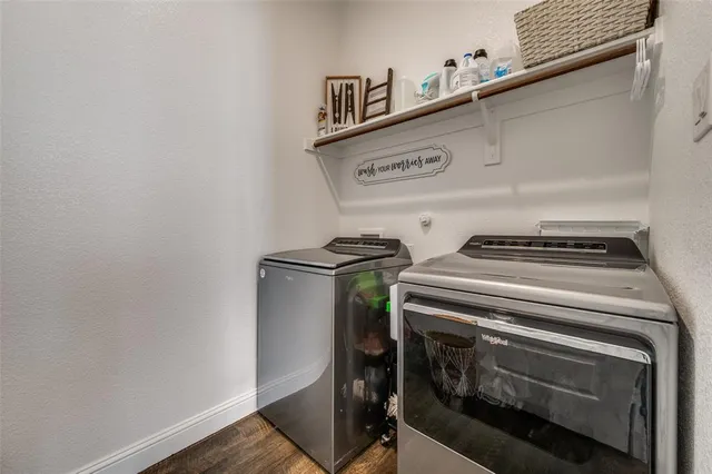 a stove top oven sitting inside of a kitchen