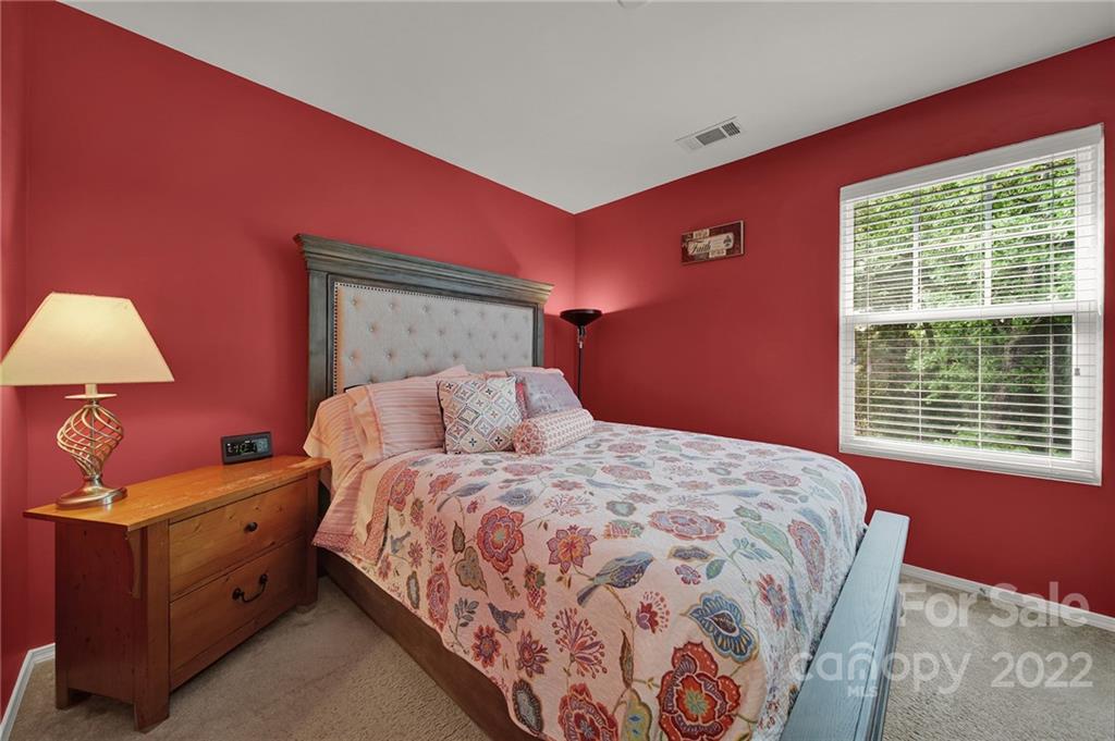 423 Hunters Dance Road Fort Mill, SC 29708 - Photo 18 of 25 a bedroom with a bed and a window