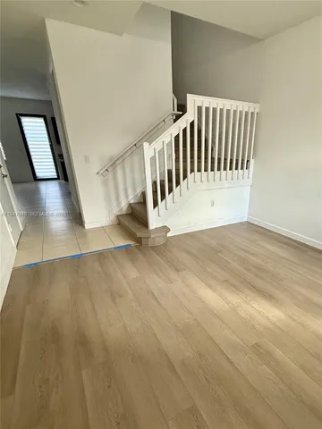 a view of a garden with a bench