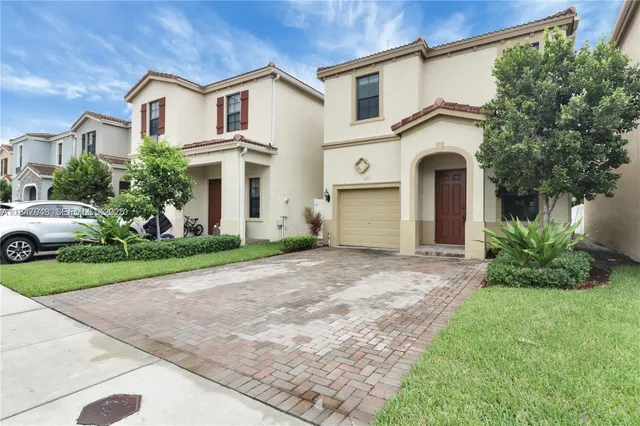a view of outdoor space yard and front view of a house