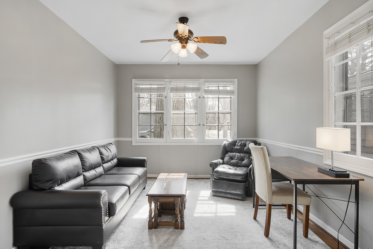 515 Maple Avenue Wilmette, IL 60091 - Photo 8 of 24 a living room with furniture and a large window