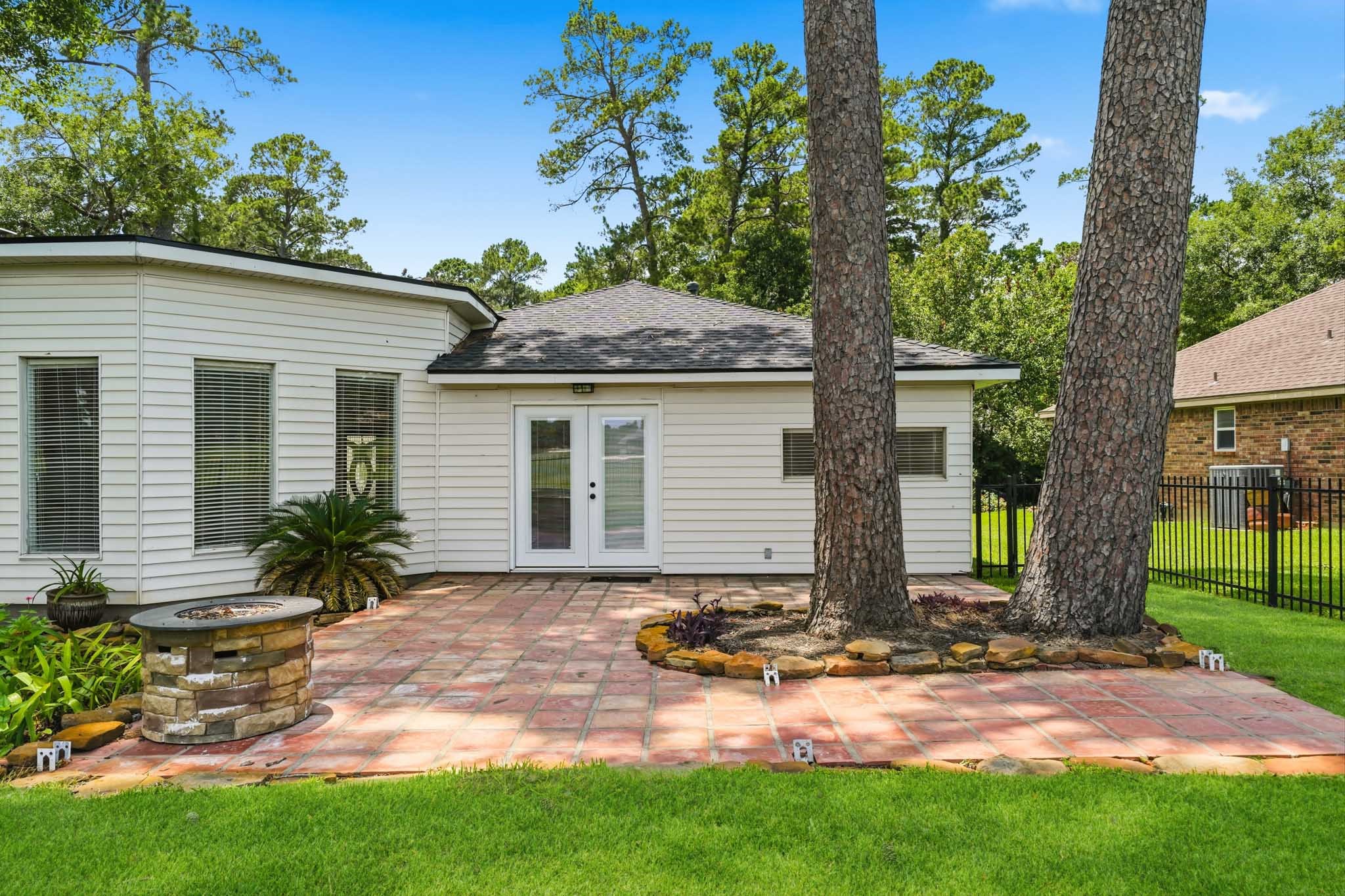 79 Summers Wind Street Conroe, TX 77356 - Photo 38 of 45 a front view of house with yard and green space