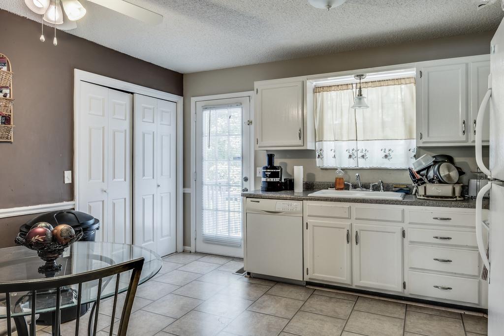 3548 Country Way Road Antioch, TN 37013 - Photo 5 of 15 a kitchen with stainless steel appliances granite countertop a sink and cabinets