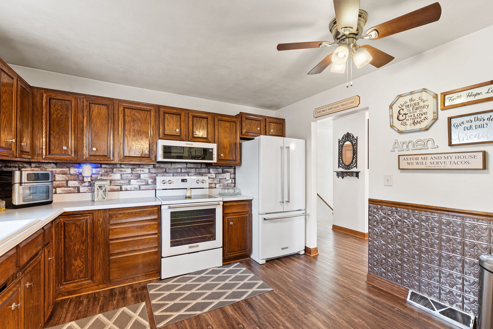 110 Andrea Court Cleveland, IL 61241 - Photo 9 of 23 a kitchen with granite countertop a refrigerator stove top oven and sink
