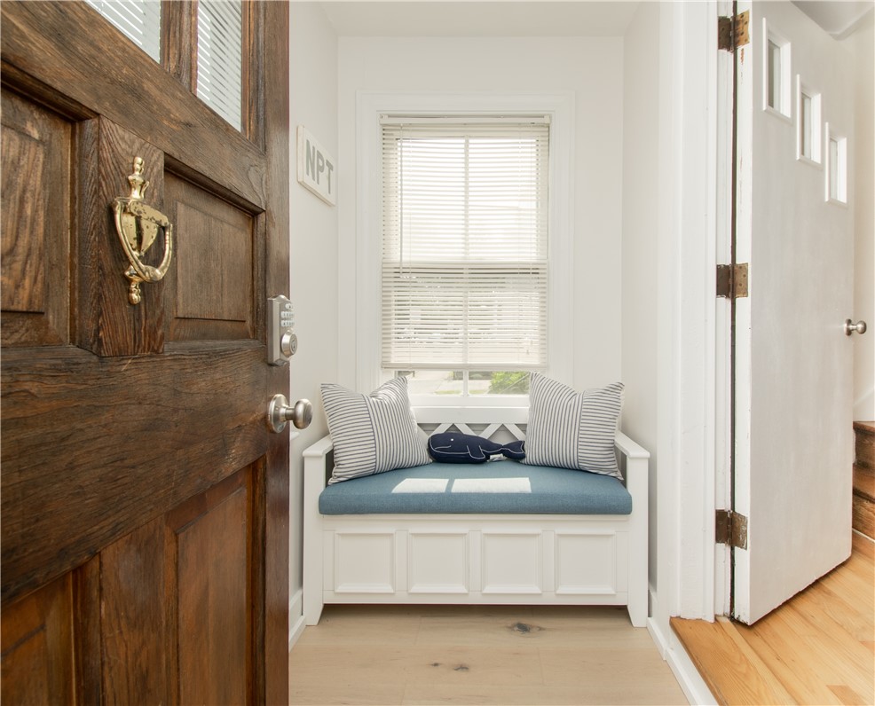 Welcoming enclosed mud room
