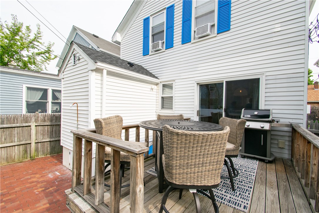 33 Slocum Street Newport, RI 02840 - Photo 17 of 31 deck off kitchen and outdoor shower on brick patio area.