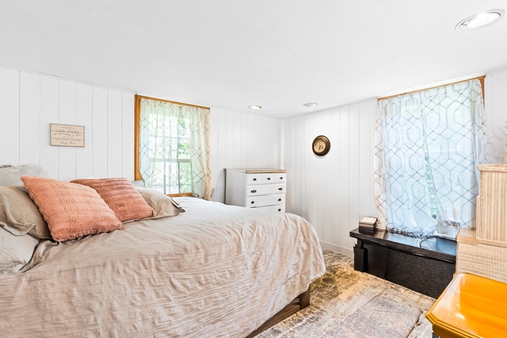 756 Northfield Road Lunenburg, MA 01462 - Photo 20 of 38 a bedroom with a bed and a window