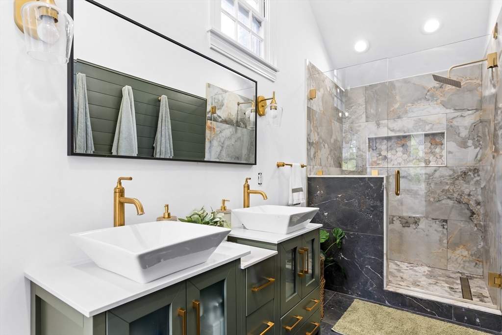 756 Northfield Road Lunenburg, MA 01462 - Photo 27 of 38 a bathroom with a sink and a mirror