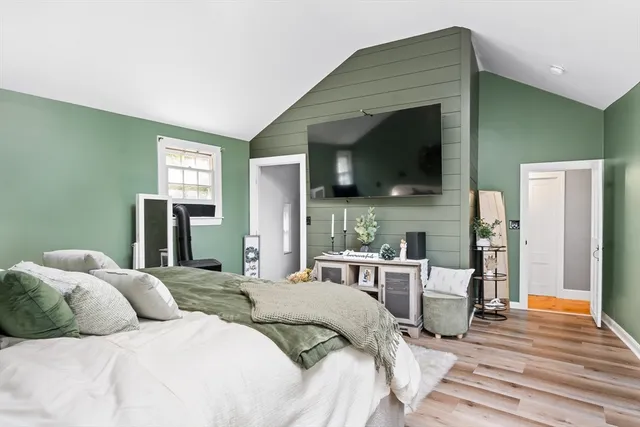 a backyard of a house with yard and outdoor seating